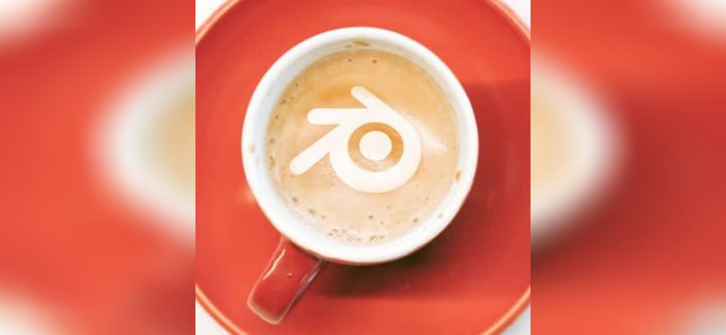 A white coffee cup with latte art featuring a stylized logo sits on a red saucer.