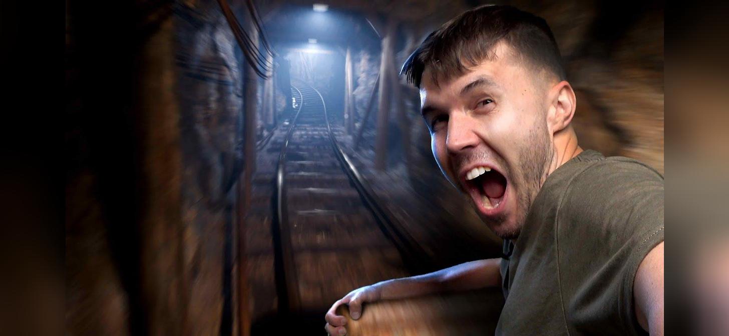 Man screaming in a dark tunnel with tracks, possibly from a stylized graphic or 3D render.