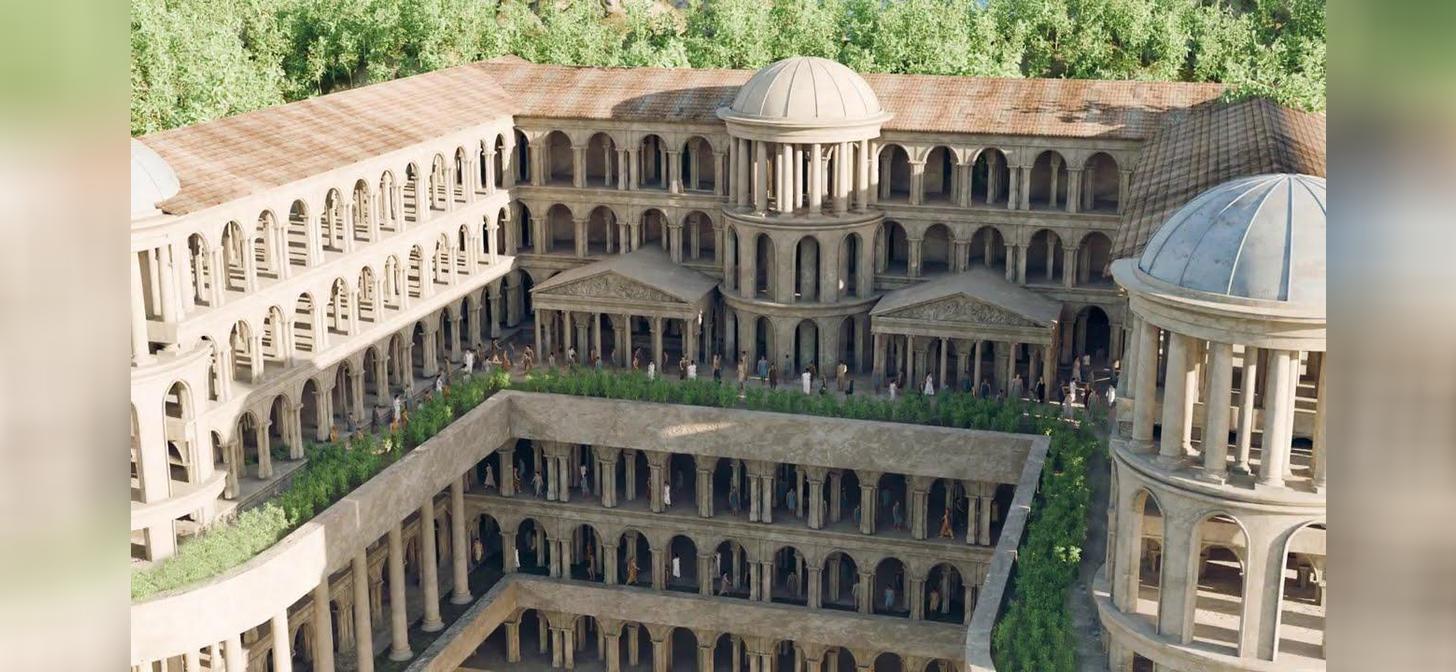 Aerial view of a detailed, classical architectural complex with multiple domed structures and arched walkways.